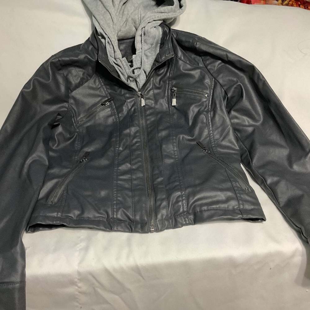 Faux leather jacket with hoodie lining. Size large.  W70